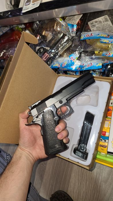 Игрушка металичиские пистолет