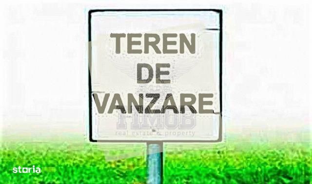 Teren intravilan 1570 mp utilitati intre case pe strada asfaltata