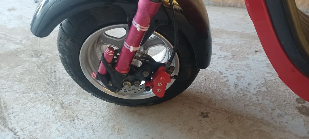 Электроскутер White Siberia.