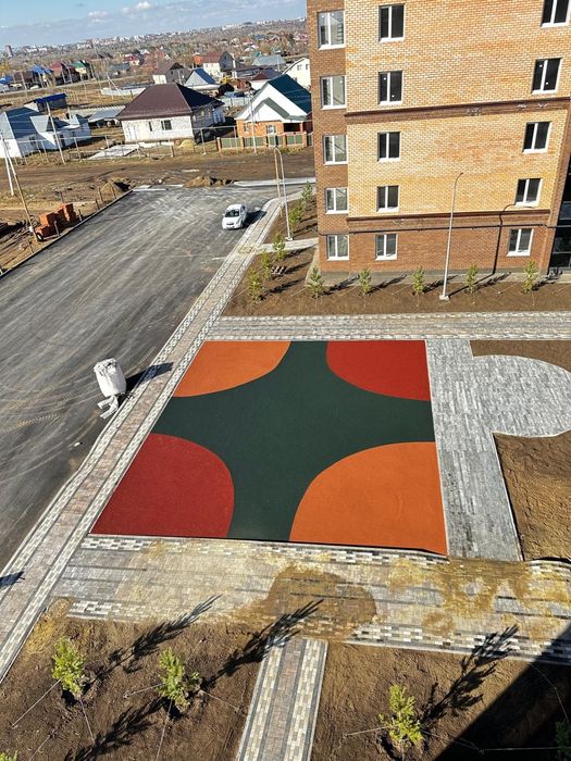 Резиновые покрытие, тартан