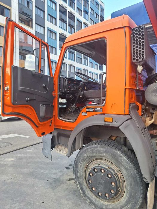 Автомобиль Камаз 65115 самосвал