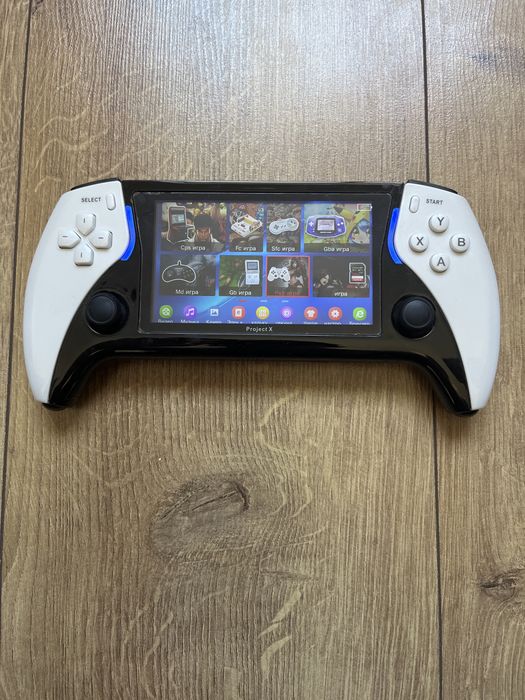 Срочно продам игровую приставку project x