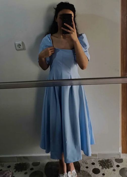 Rochie elegantă midi