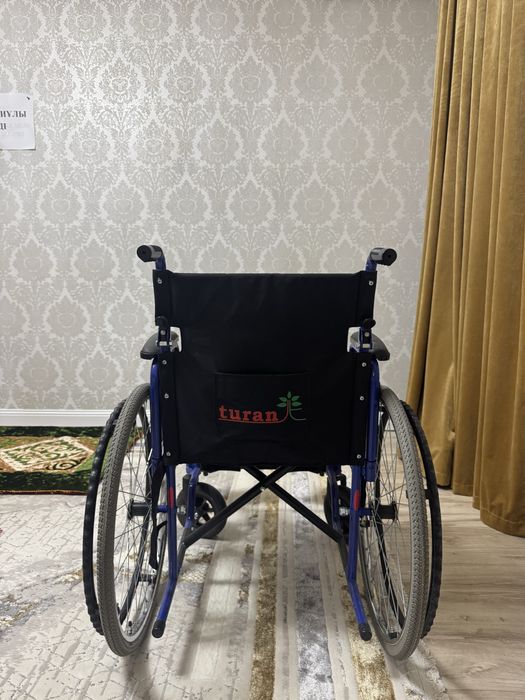 Инвалидная коляска