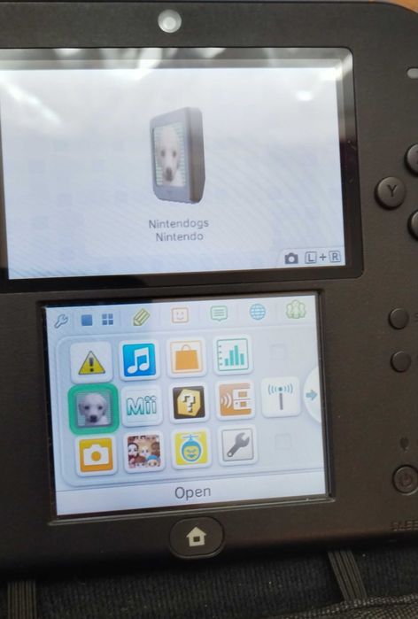 Nintendo 2ds +6 игри, SD карта пемет