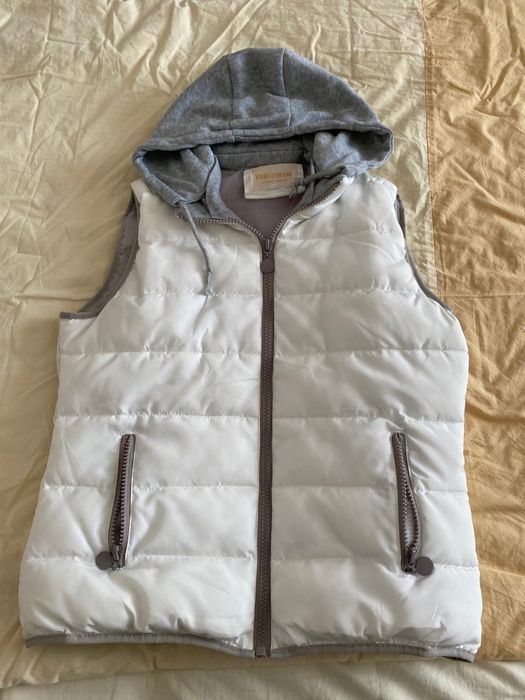 Продам пуховой жилет новый