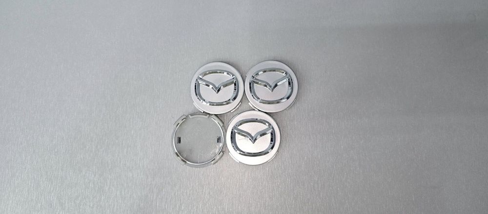 Капачки за джанти Мазда/Mazda 56мм
Чисто