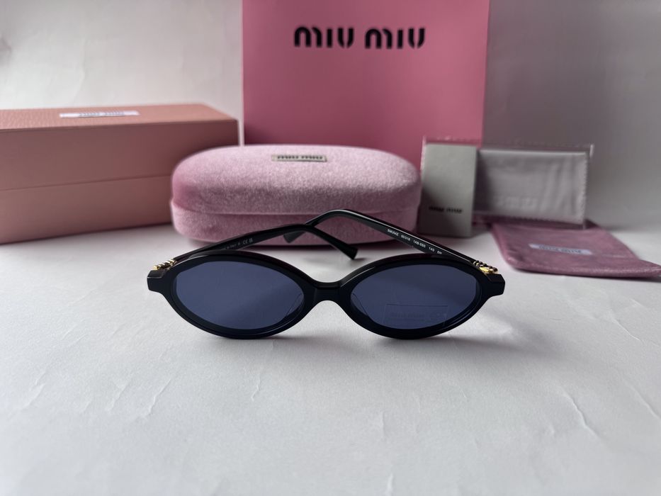 Ochelari de soare Miu Miu Oval SMU04Z 50-18 140, Noi