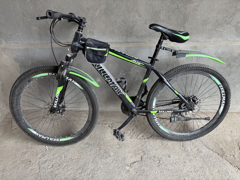 Велосипед горный зеленего цвета состояние хорошое