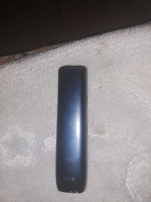 Un iqos și doua cuti cu filtre cu arome
