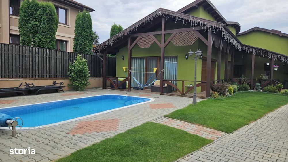 Casa in Livezeni cu piscina,garaj,pivnita foisor, solare si  720 mp