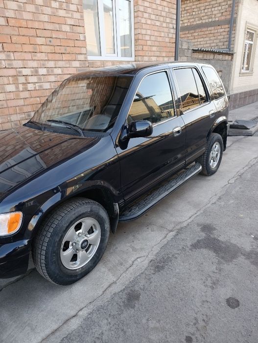 Киа спортейдж 1 поколения