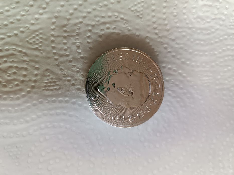 Монета серебряная