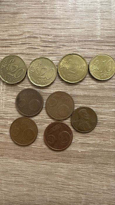 Монеты евроценты и американские центы