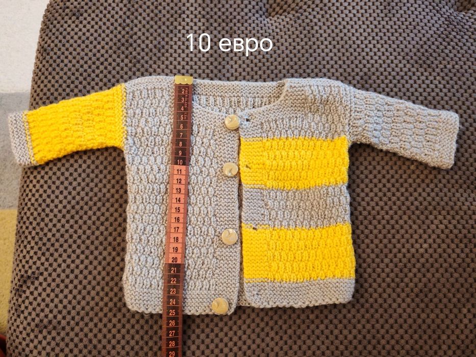 Бебешки плетени жилетки