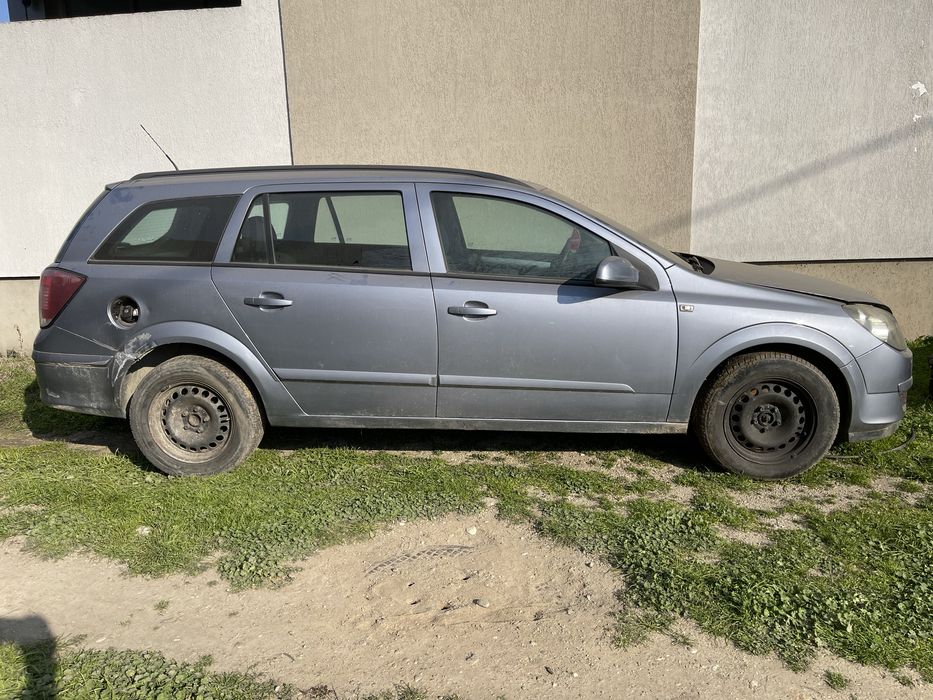 Macara geam motoras broasca usa opel astra h