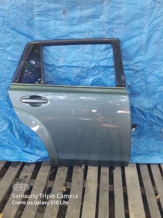 Двери  на    Subaru Outback BR  .