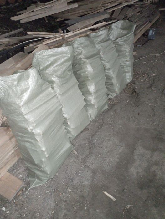 Дрова в мешках 1000