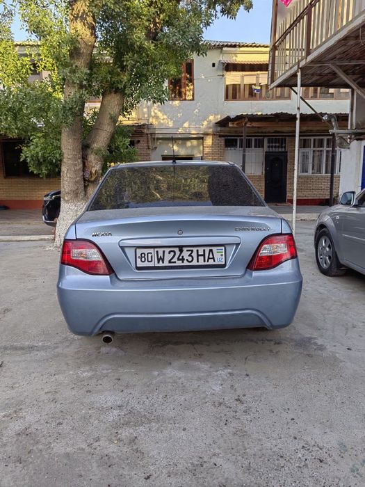 нексия 2 год 2013