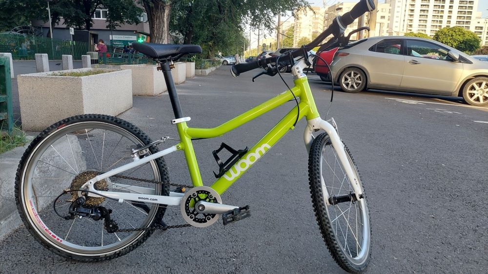 Woom 4 Neon Lime 20” – 7 viteze – 7,8 kg + cric Woom. Unic proprietar