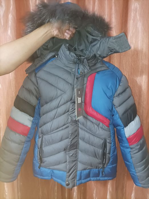 Продам зимний пуховик 30000