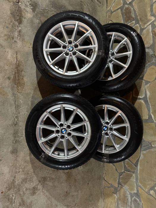 Vând set complet jante BMW R17 + anvelope de iarnă Goodyear