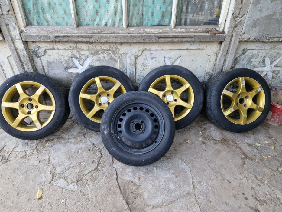 4 Roți 195/60  R15 Ford Focus 1 Aliaj + 1 Tablă