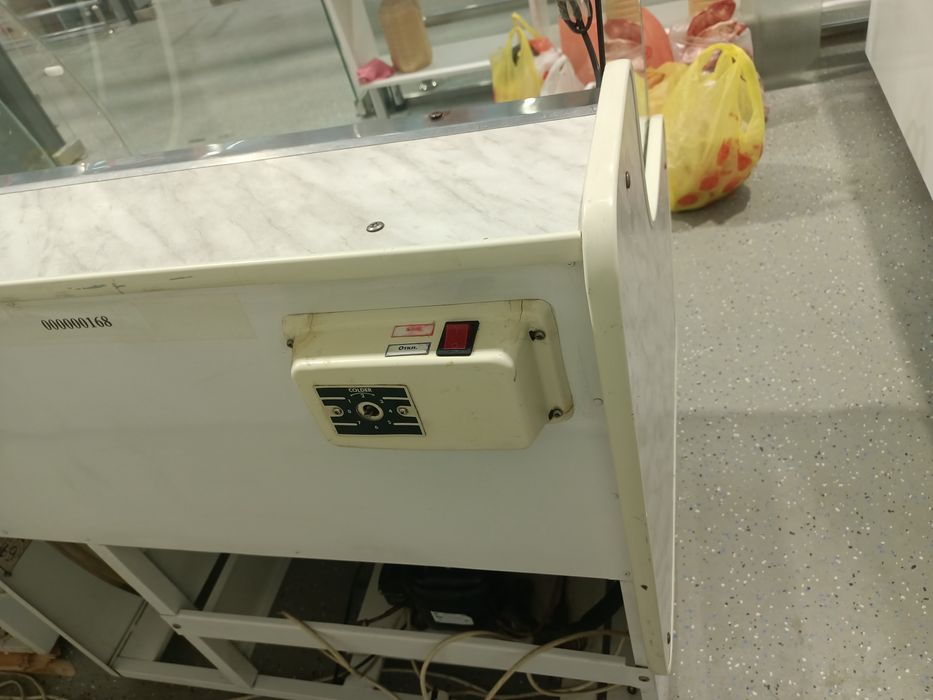 Холодильник вертикальный