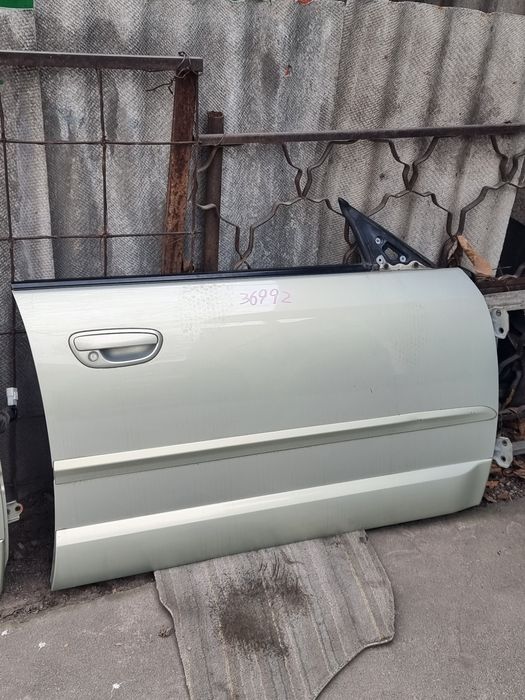 Двери на Subaru Outback BP.