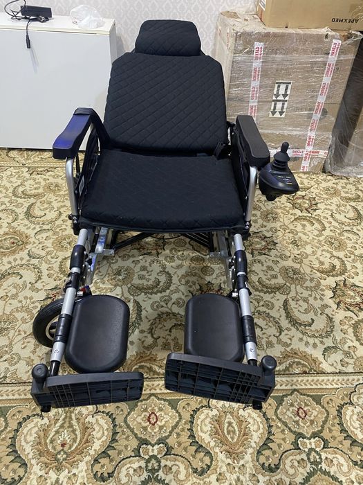 Электрическая коляска для инвалидов
