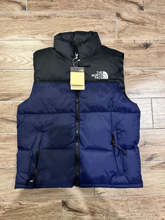 The North Face жилетка пух
