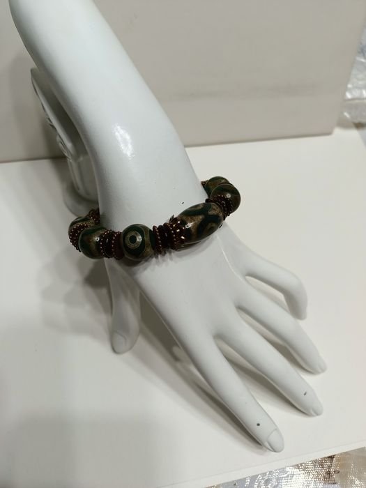 Браслеты с натуральным камнем дзи