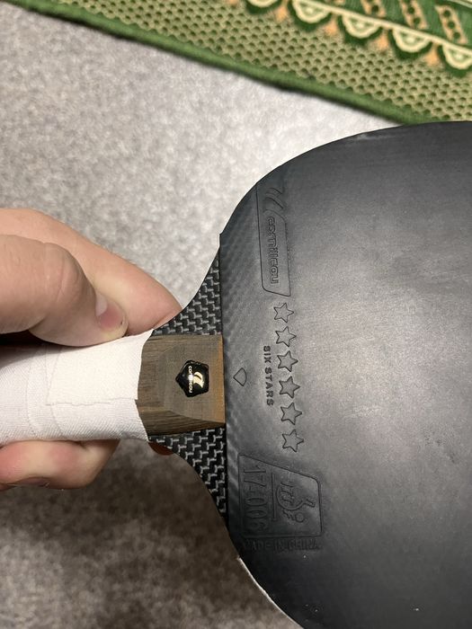 Теннисная ракетка