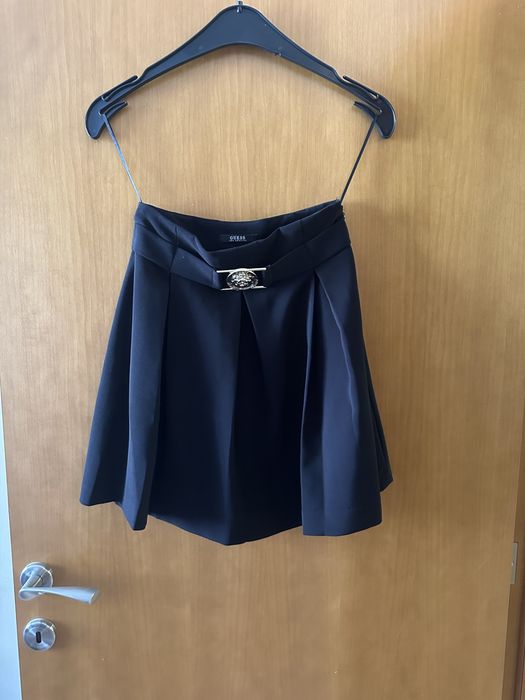 Поли Guess.