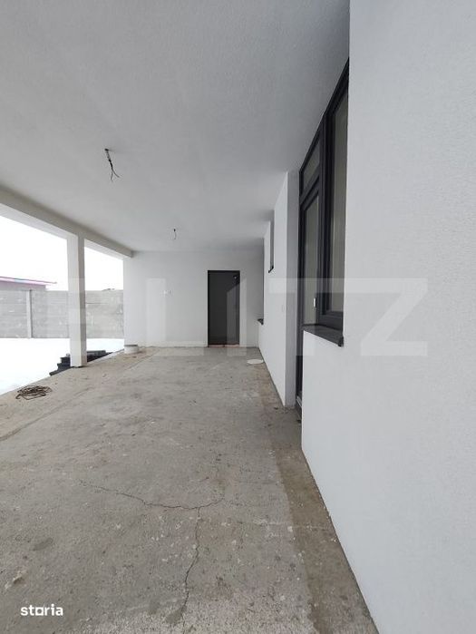 Casa finisata la cheie racordata la toate utilitatile in Santandrei