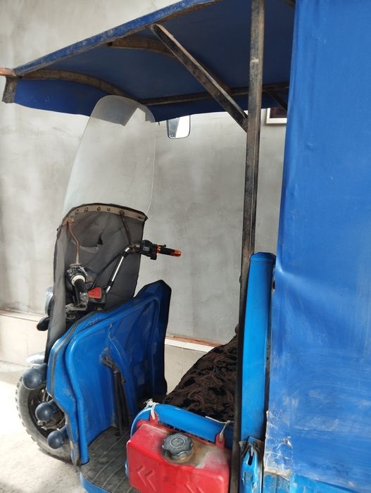 Uch gildirakli skuter