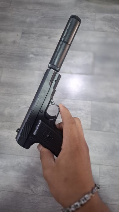 Игрушечный металлический писталет