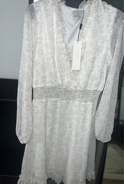 Rochie de damǎ cu flori