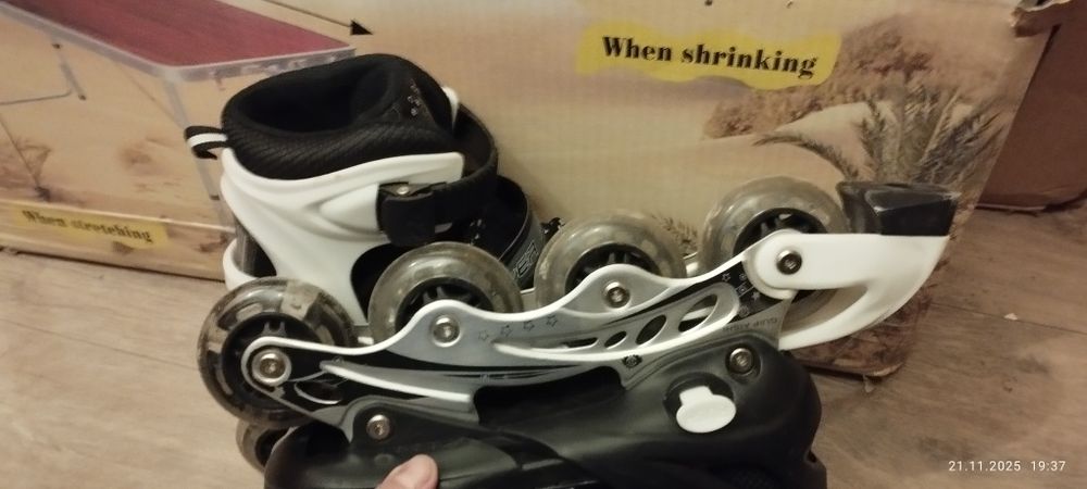 Роликовые коньки