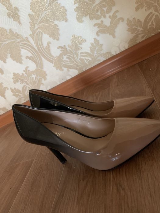 Новые туфли киылмеген