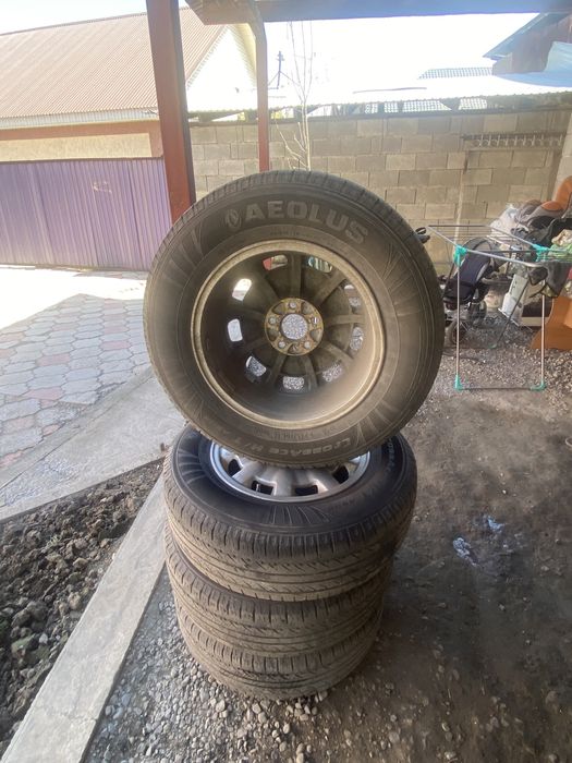 Продам диски резиной rav4