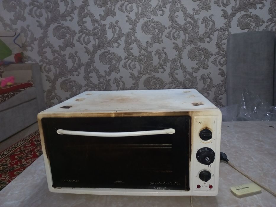 Продам электропечьку духовку