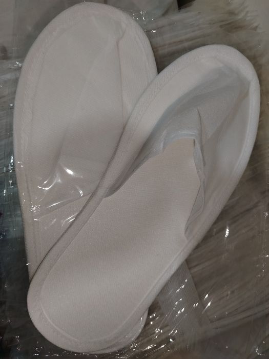 Одноразовые тапочка сотилади