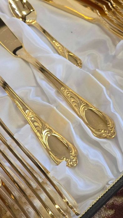 Set tacâmuri aurite SBS Solingen pentru 12 persoane,