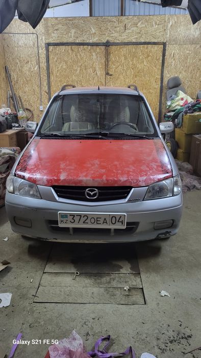 Мазда демио 2002год