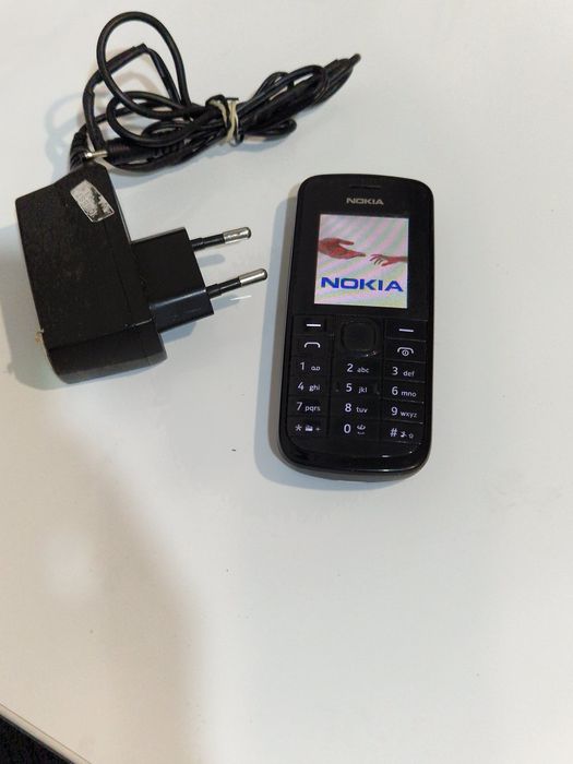 Telefon Nokia cu butoane cu încărcător original