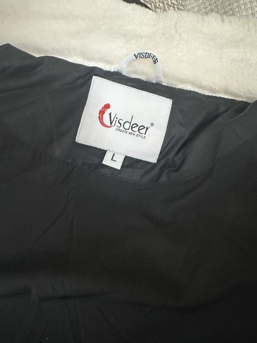 Продам пуховик женский