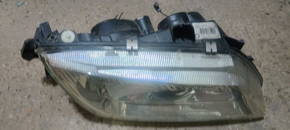 фар за нисан алмера 2000-2002г.