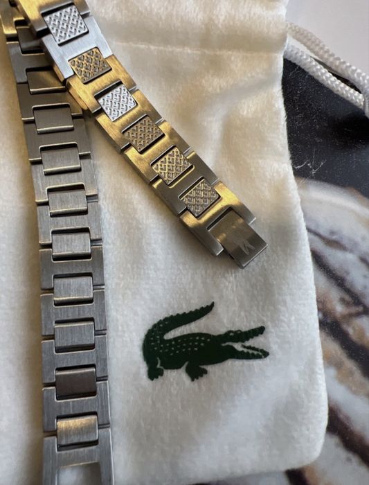 Lacoste гривна.