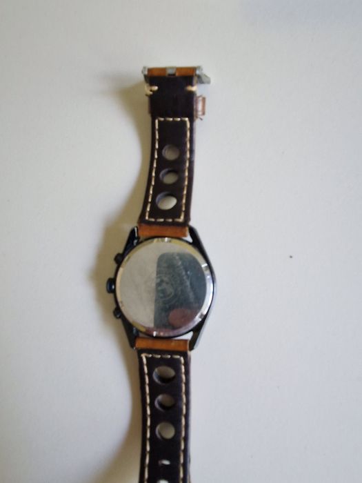 Часы Citizen Eco Drive.